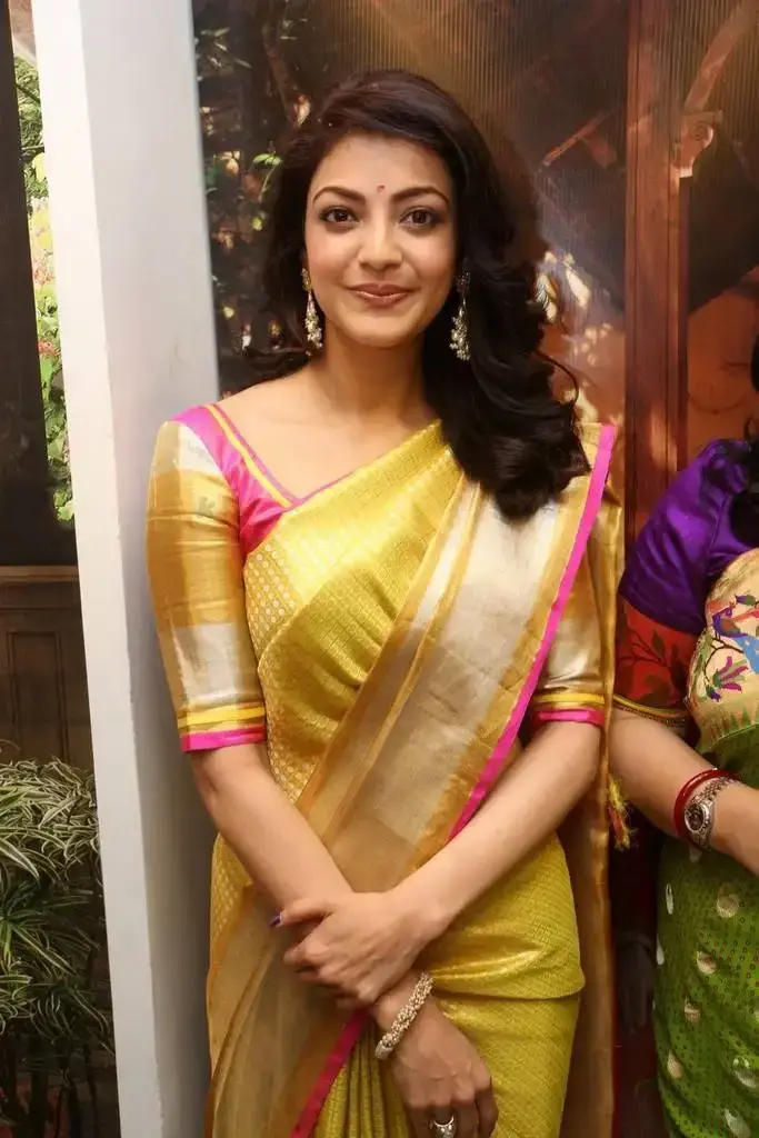 Kajal Aggarwal In Yellow Saree At Designer Store Launch